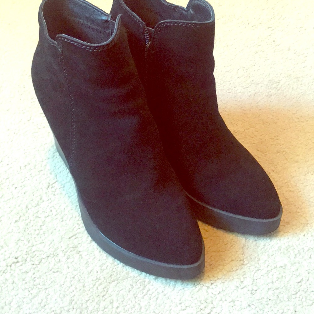Women’s black wedge booties
